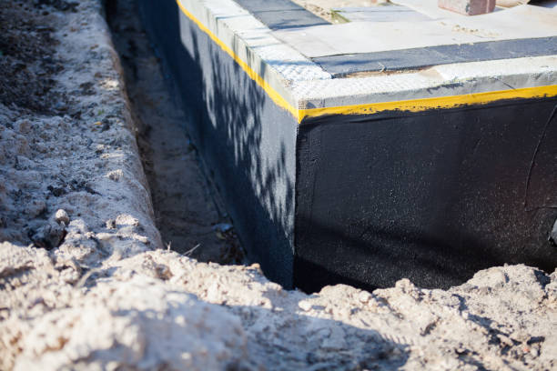 Professional Exterior Waterproofing technician working in Richmond, KY
